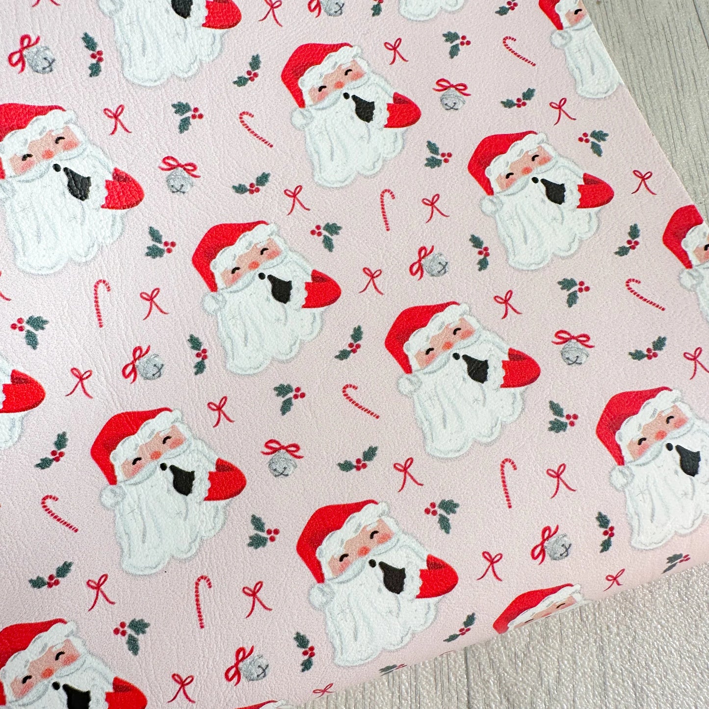 Red Santa with Bows on Pale Pink Leatherette